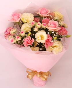 春色の優しい花束/名古屋市内の送別会に花束を配達します。